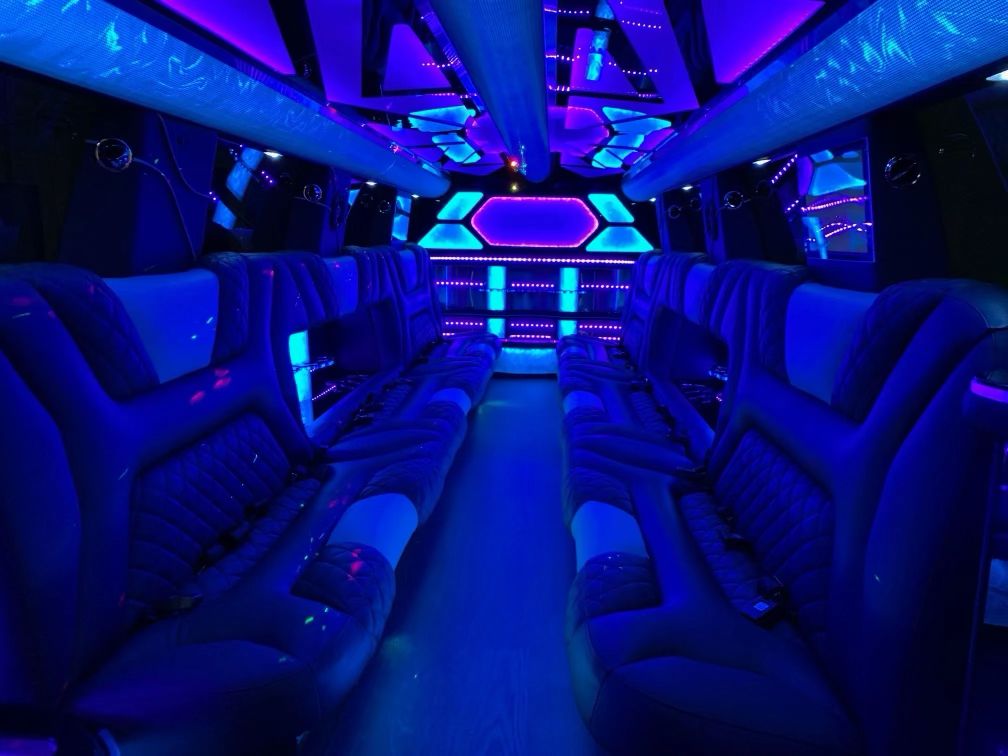 Escalade stretch limo interior with LED lighting and bar