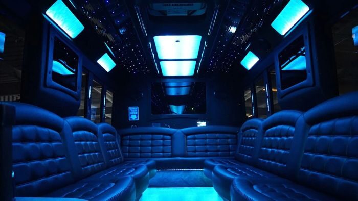 Wraparound seating and blue LED lights – Aspen limo service