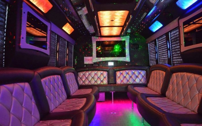 Party bus lounge with LED ceiling – Aspen limo service
